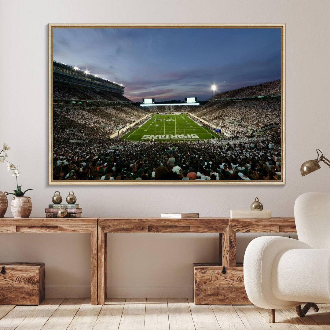 Wall art featuring a stadium at dusk with full stands—ideal for the Michigan State Spartans Football Team Canvas Print.