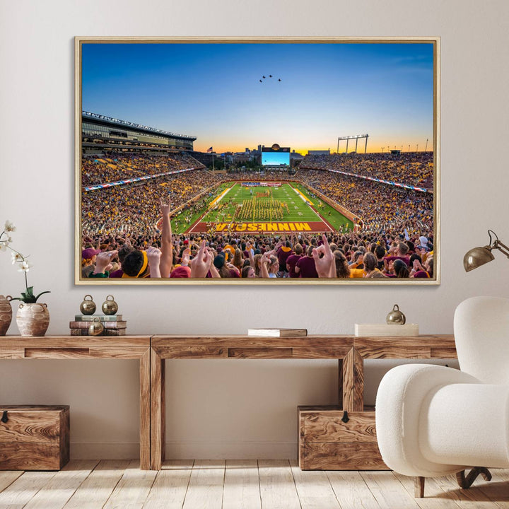 Canvas wall art featuring the University of Minnesota Football Team print, showcasing Huntington Bank Stadium at sunset with jets overhead.