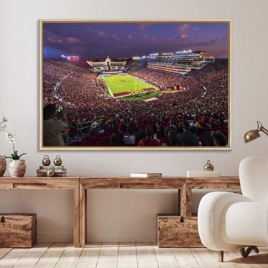 The vibrant wall art canvas print captures the USC Trojans playing under lights at dusk in LA Memorial Coliseum.