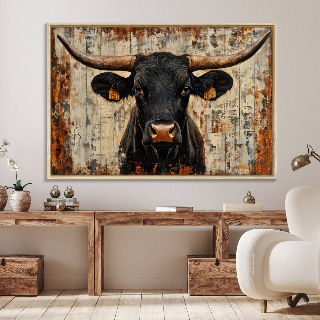 Black bull painting with horns and ear tags, ideal for rustic Texas decor - Abstract Cow Longhorn Bull Canvas Print.