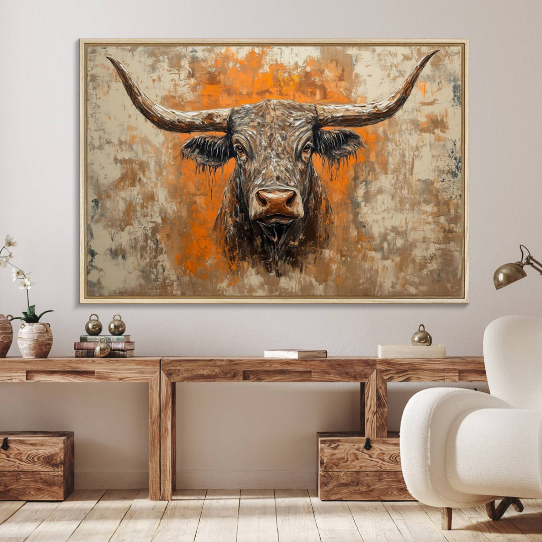 Abstract Cow Longhorn Bull Wall Art presents a detailed face centered on a textured orange and beige background.