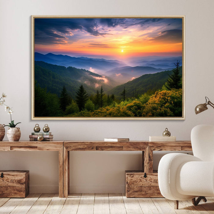 The Majestic Mountain Sunrise Print features a vibrant sky, layered hills, and evergreens, making it a stunning piece of wall decor.