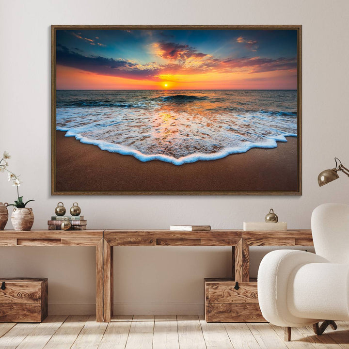 A Sunset with Calm Waves on the Beach Wall Art Canvas Print adorns the dining room.