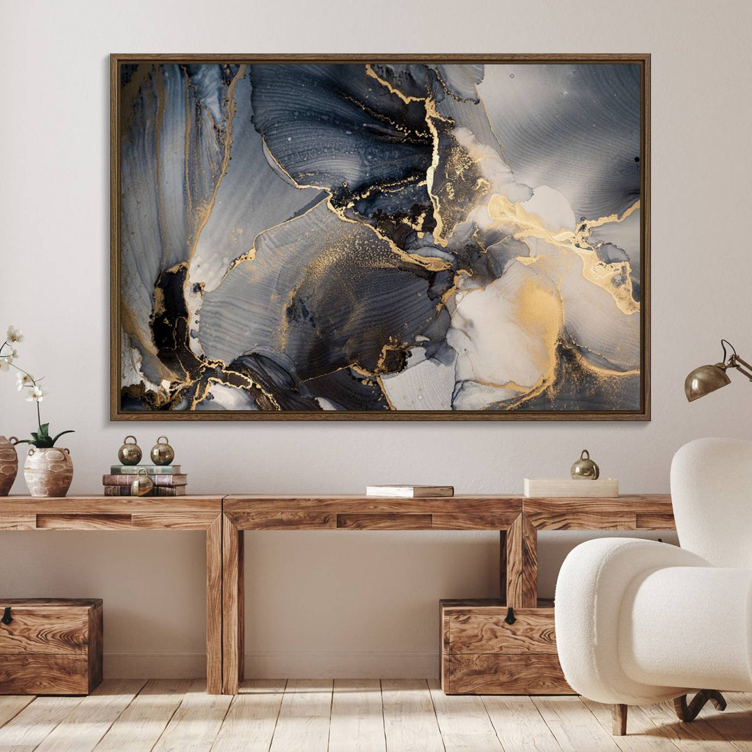 A Modern Marble Fluid Effect Abstract Wall Art with black, white, and gold swirls hangs in a modern kitchen.