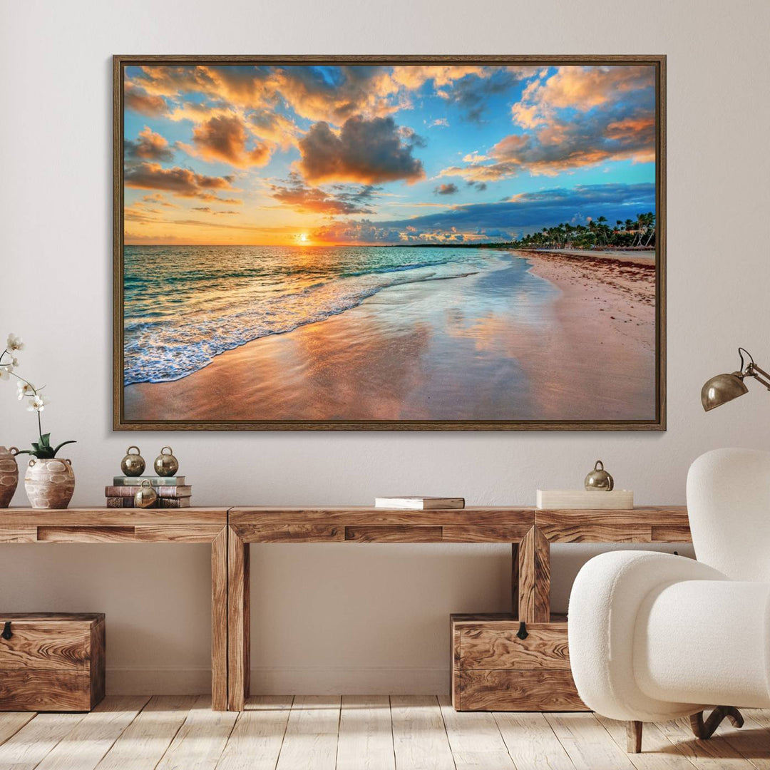 A wall displays Sunset Ocean Waves on Tropical Beach 3-panel canvas art.