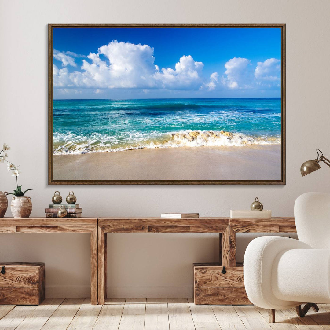 The Tropical Beach 3-Panel Canvas Wall Art features ocean waves gently lapping on a beach under blue skies, making it an ideal choice for coastal decor.