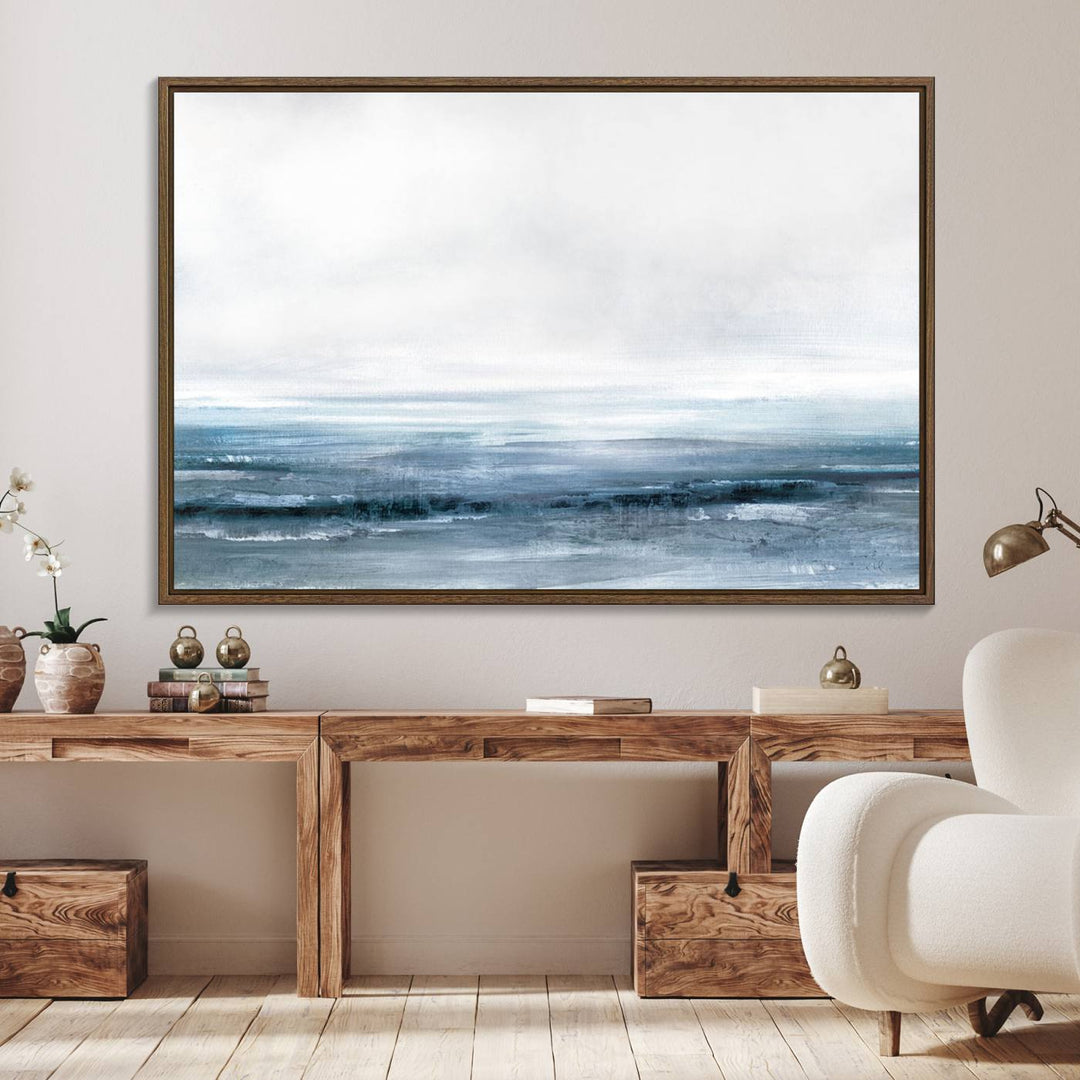 The dining area features Blue Ocean Abstract Artwork on canvas.