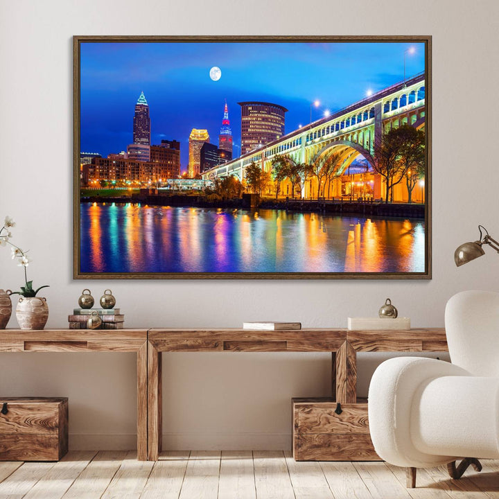 A Cleveland Night Skyline Wall Art on museum-quality canvas showcases a bridge and illuminated buildings.