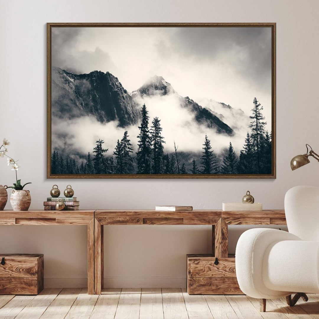 A large foggy mountain forest canvas print hangs prominently in the room.