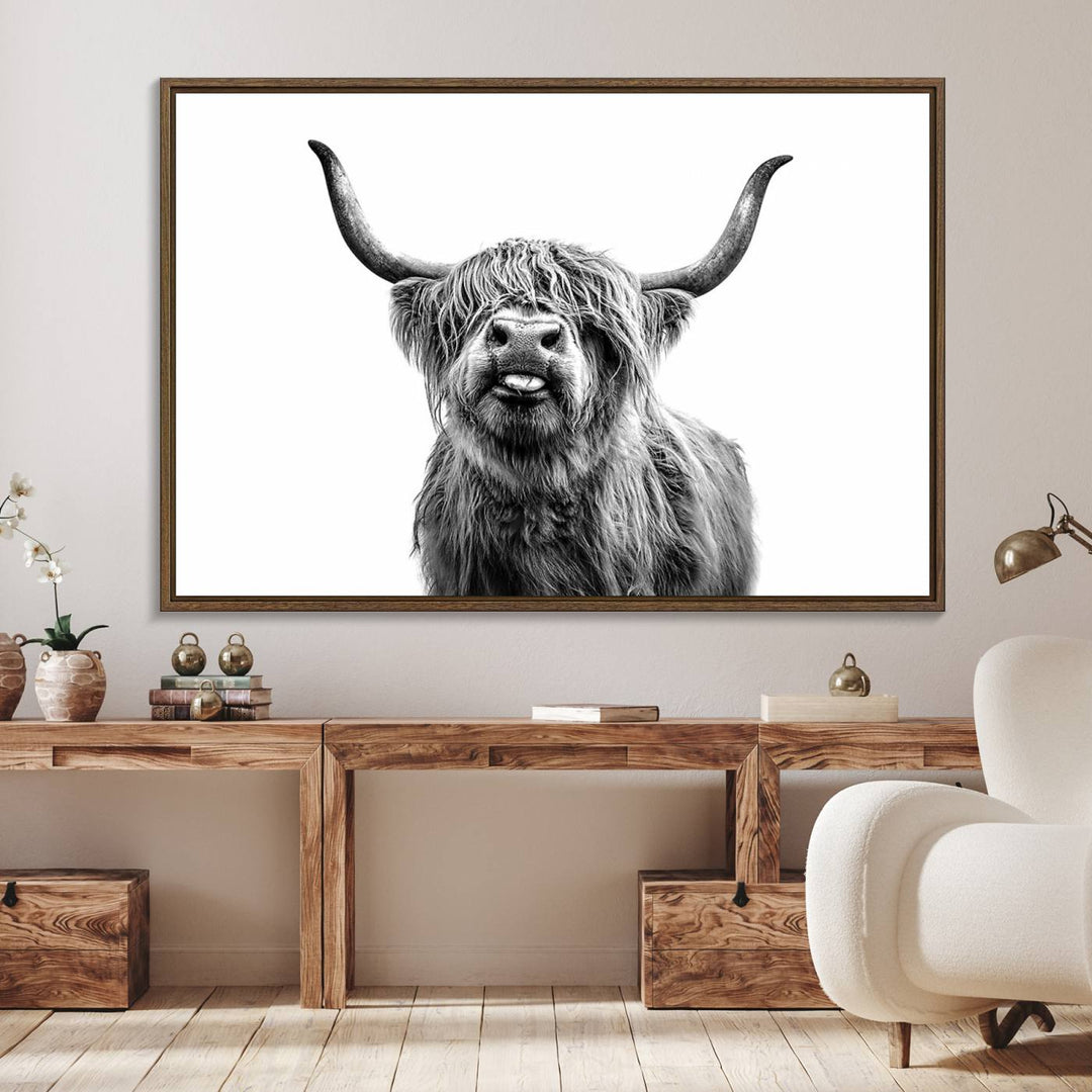 The Fanny Highland Cow art print decorates the modern kitchen, featured in black and white.