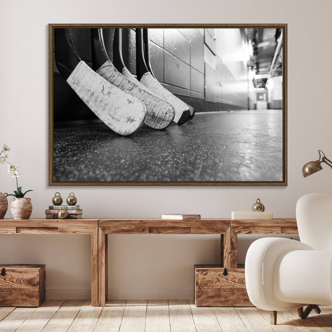 Ice Hockey Wall Art Canvas Print features a UV-protected black and white photo of hockey sticks.