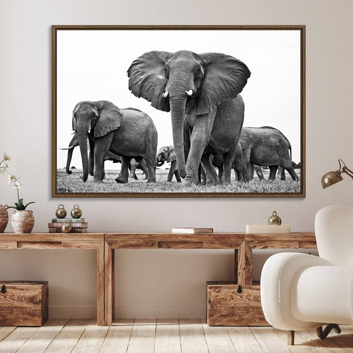 A modern dining area features a Black White Elephant Family Wall Art Canvas Print.