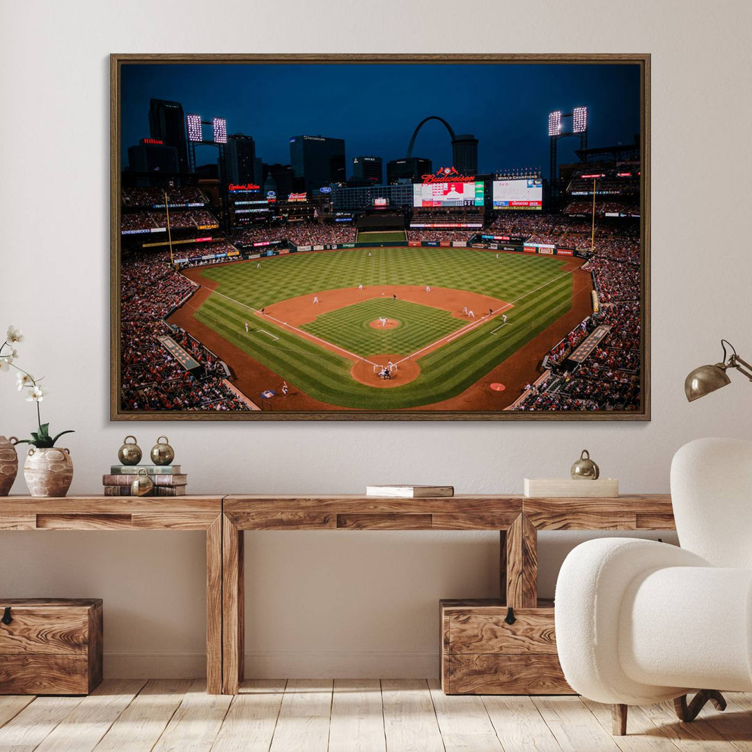 A St. Louis Cardinals Baseball Team print of Busch Stadium at night adorns the wall.