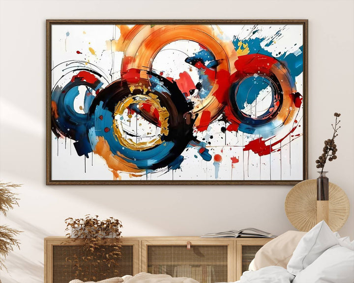 The Abstract Wall Art Rings Canvas Print, with its bold and colorful circular strokes, adorns the wall, epitomizing contemporary design.