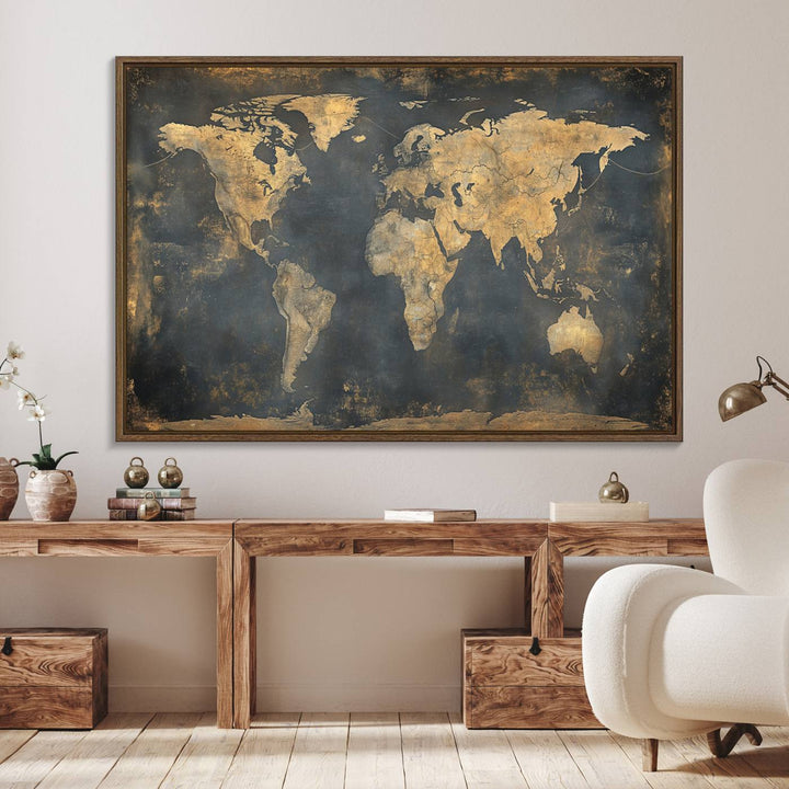 The Grunge World Map Canvas Wall Art features golden tones and is displayed against a white-paneled wall.