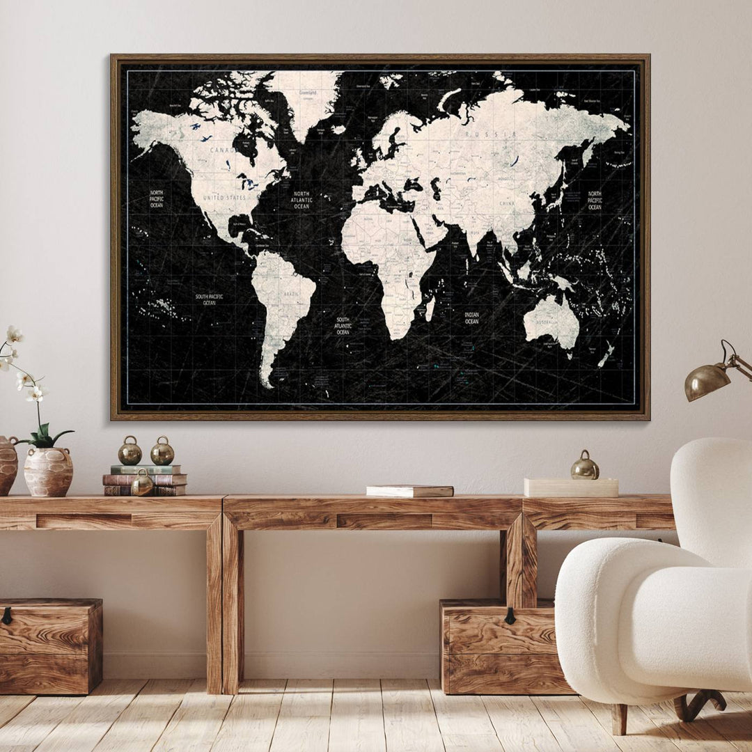 The Black & White World Map Canvas Wall Art, a giclee print, elegantly decorates the wall.