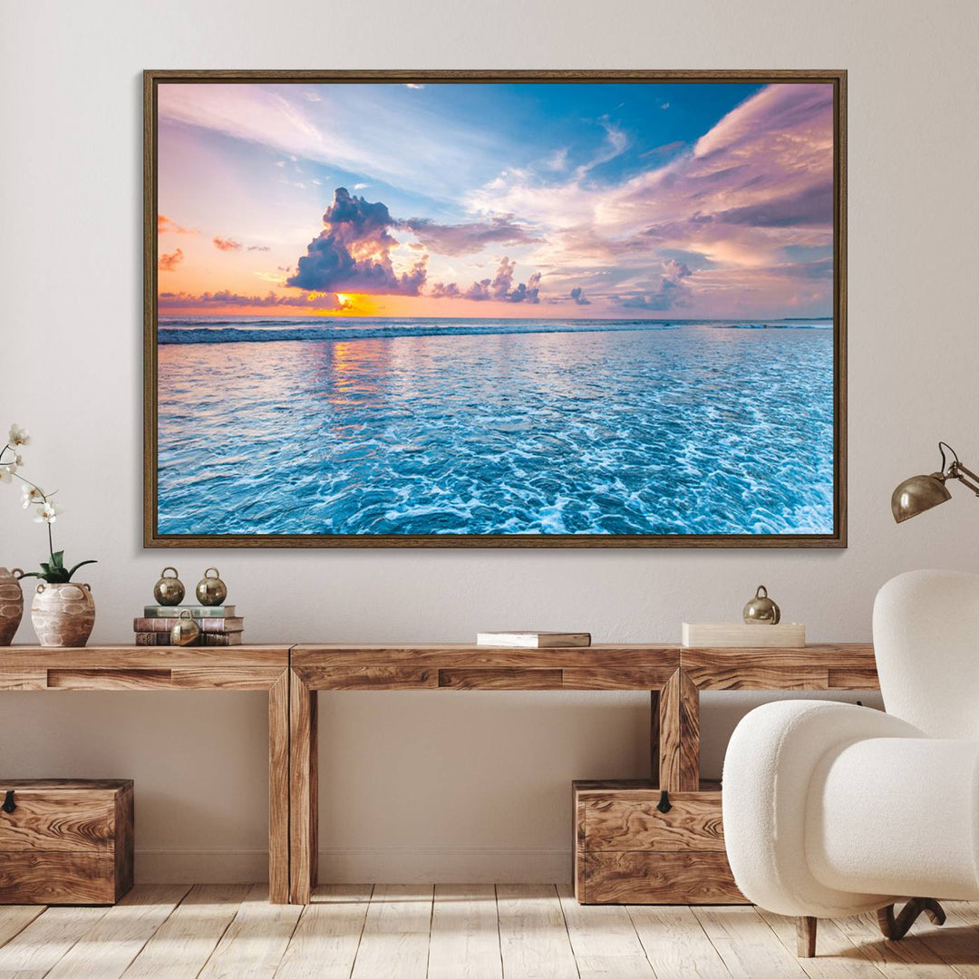 An Ocean Sunset Canvas Wall Art depicting a vibrant sky and rolling waves.