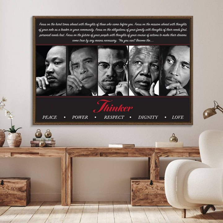 The wall art is a black and white piece featuring iconic figures accompanied by the words Thinker Peace Power Respect Dignity.