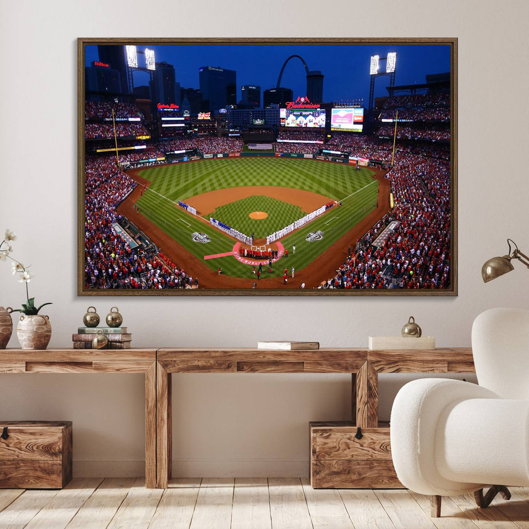 A Cardinals wall art canvas print depicts Busch Stadium with players lined up on the field and a full audience under the lights, capturing the vibrant atmosphere.