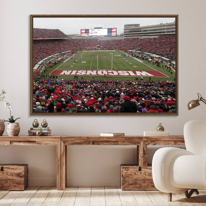 The wall art depicts WISCONSIN in red and white, similar to Wisconsin Badgers Football Canvas Art.