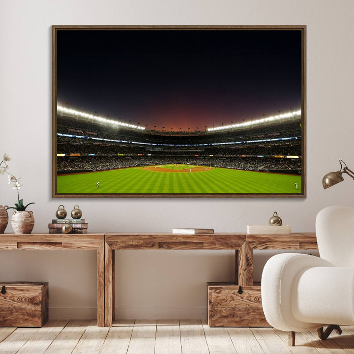 A night game at Yankee Stadium depicted on canvas beneath a sunset sky.