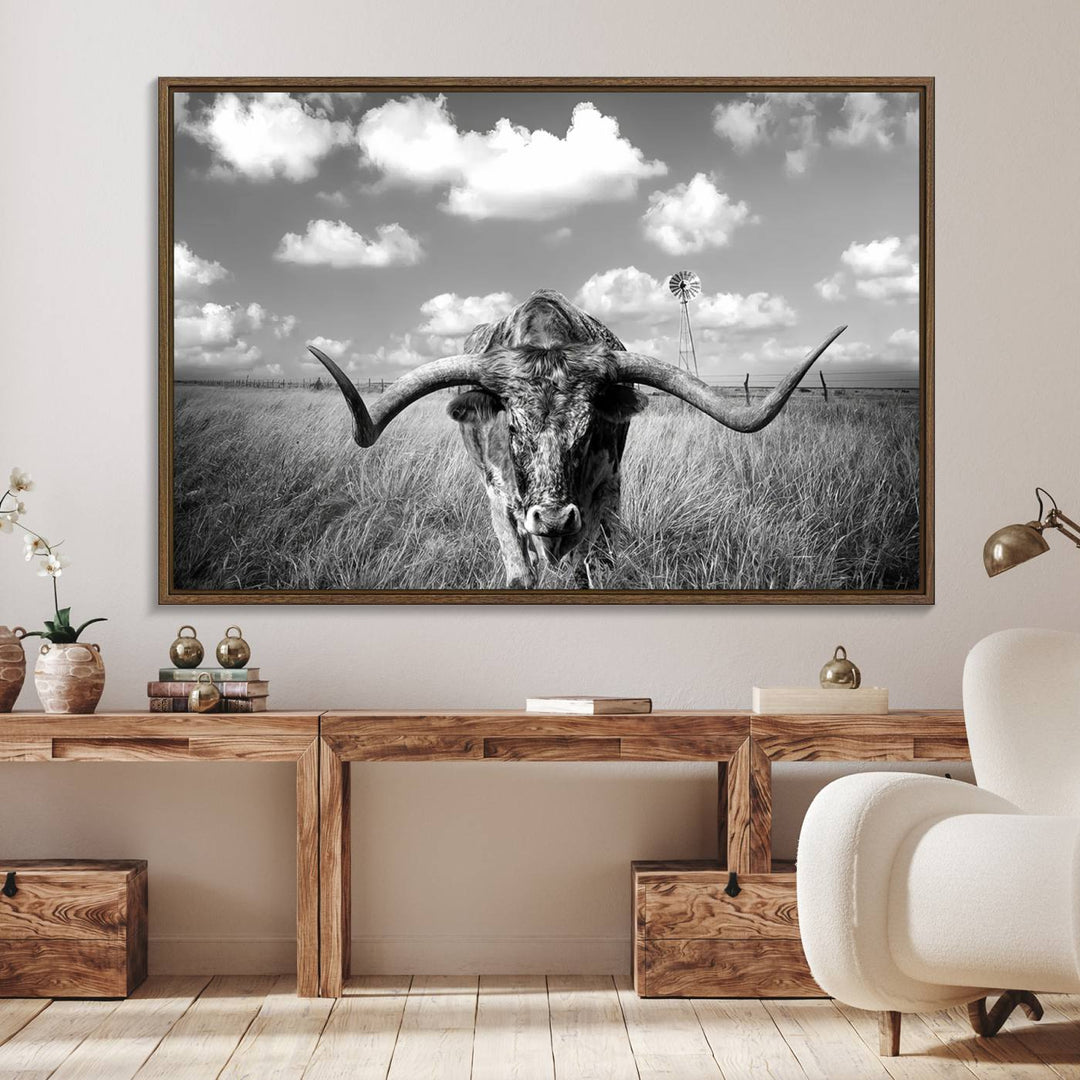 Longhorn Cow Field Canvas Print featuring rustic charm with a windmill backdrop.