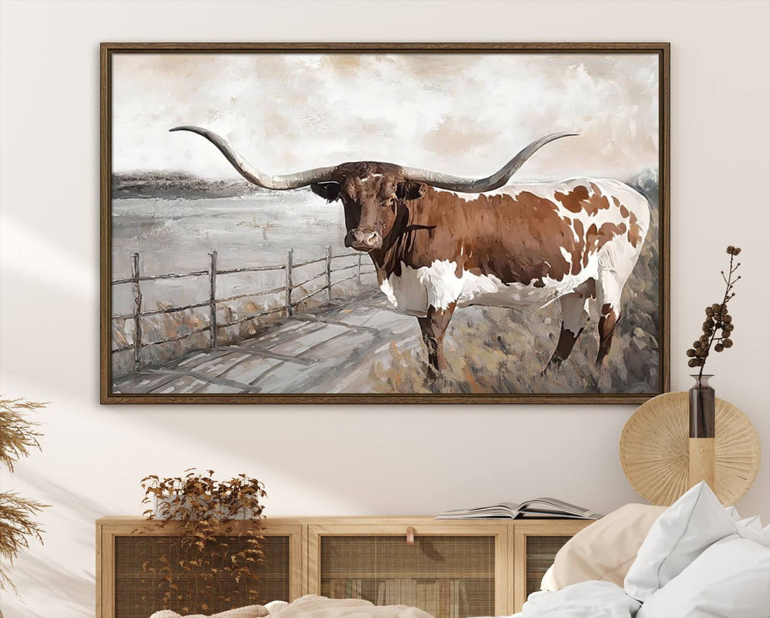 A framed Vintage Texas Cow Wall Art Canvas Print, featuring rustic longhorns, gracefully hangs above the cabinet.