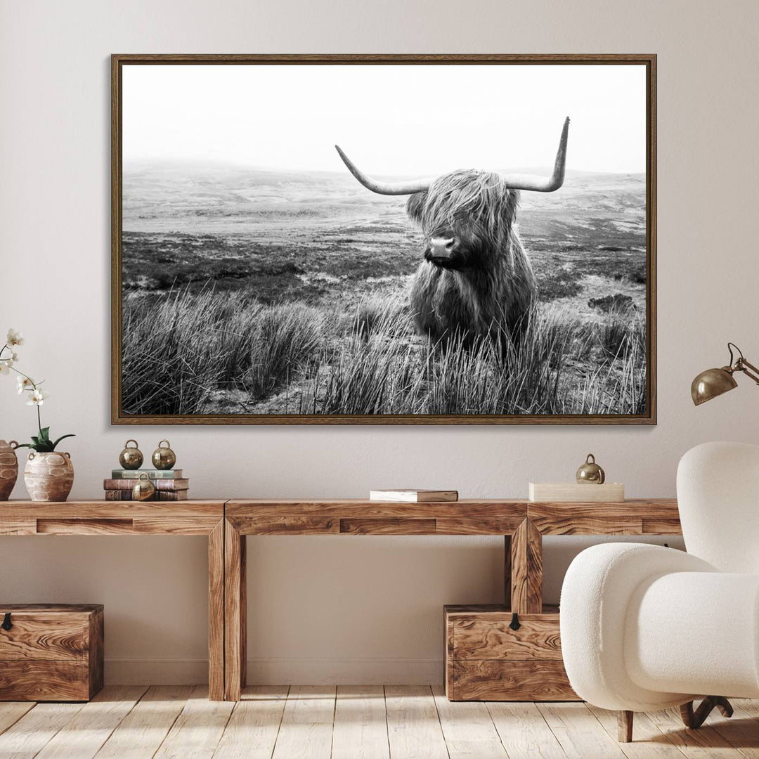 The Scottish Highland Cow black and white canvas print adds rustic farmhouse charm to any wall.