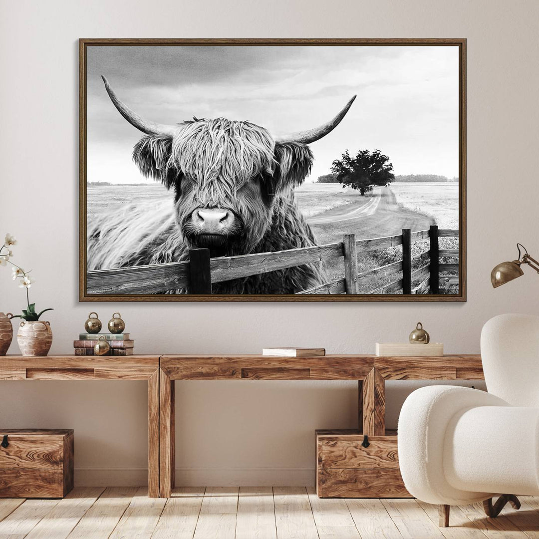 The Scottish Highland Cow Wall Art, a black and white canvas print, enhances rustic farmhouse décor.