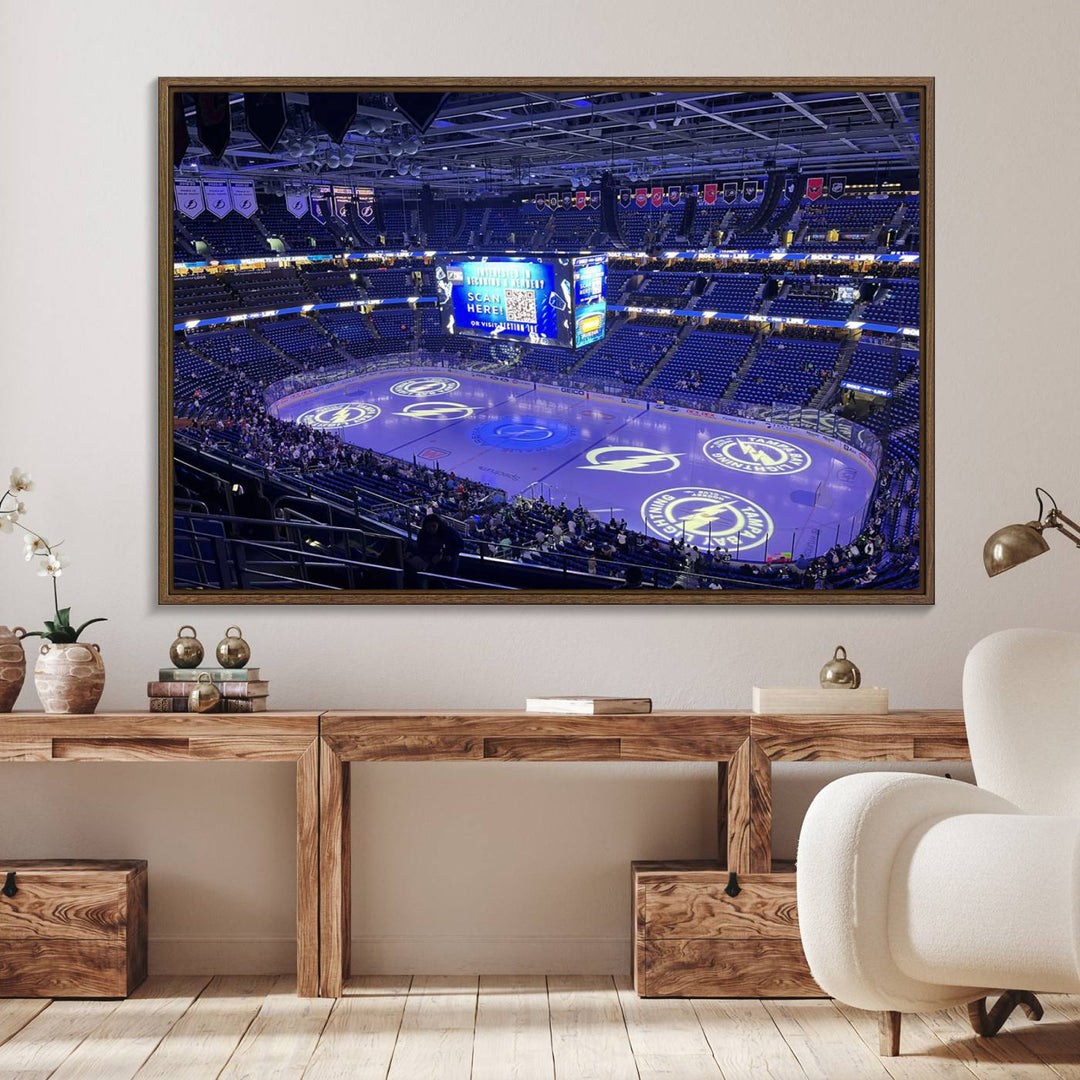 The wall art canvas print at Amalie Arena features team logos on ice, encapsulating the vibrant atmosphere of an NHL hockey stadium.