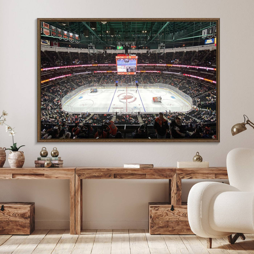 The wall art of the Honda Center California Anaheim Ducks Ice Hockey Stadium features a depiction of the rink and scoreboard from the perspective of the upper deck.