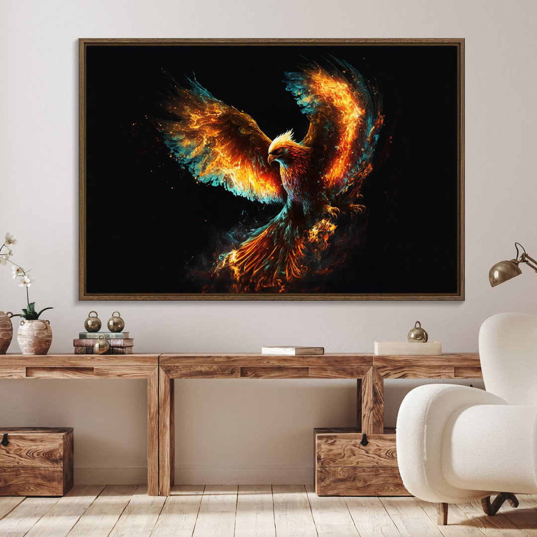 The Fiery Phoenix Canvas Print, showcasing a majestic bird with fiery wings against a black background, makes for the perfect bold decor in your living room.