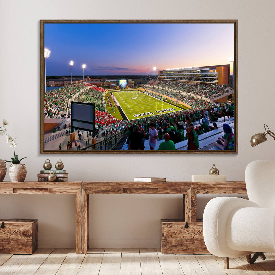 The canvas features Denton DATCU Stadium, OZEKI FIELD, illuminated under the lights and vibrant with fans supporting the University of North Texas.