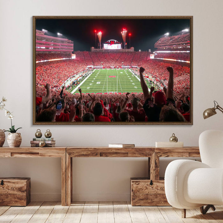 A vibrant canvas print of the Lincoln Memorial Stadium at night with fireworks, featuring the University of Nebraska Cornhuskers Football.