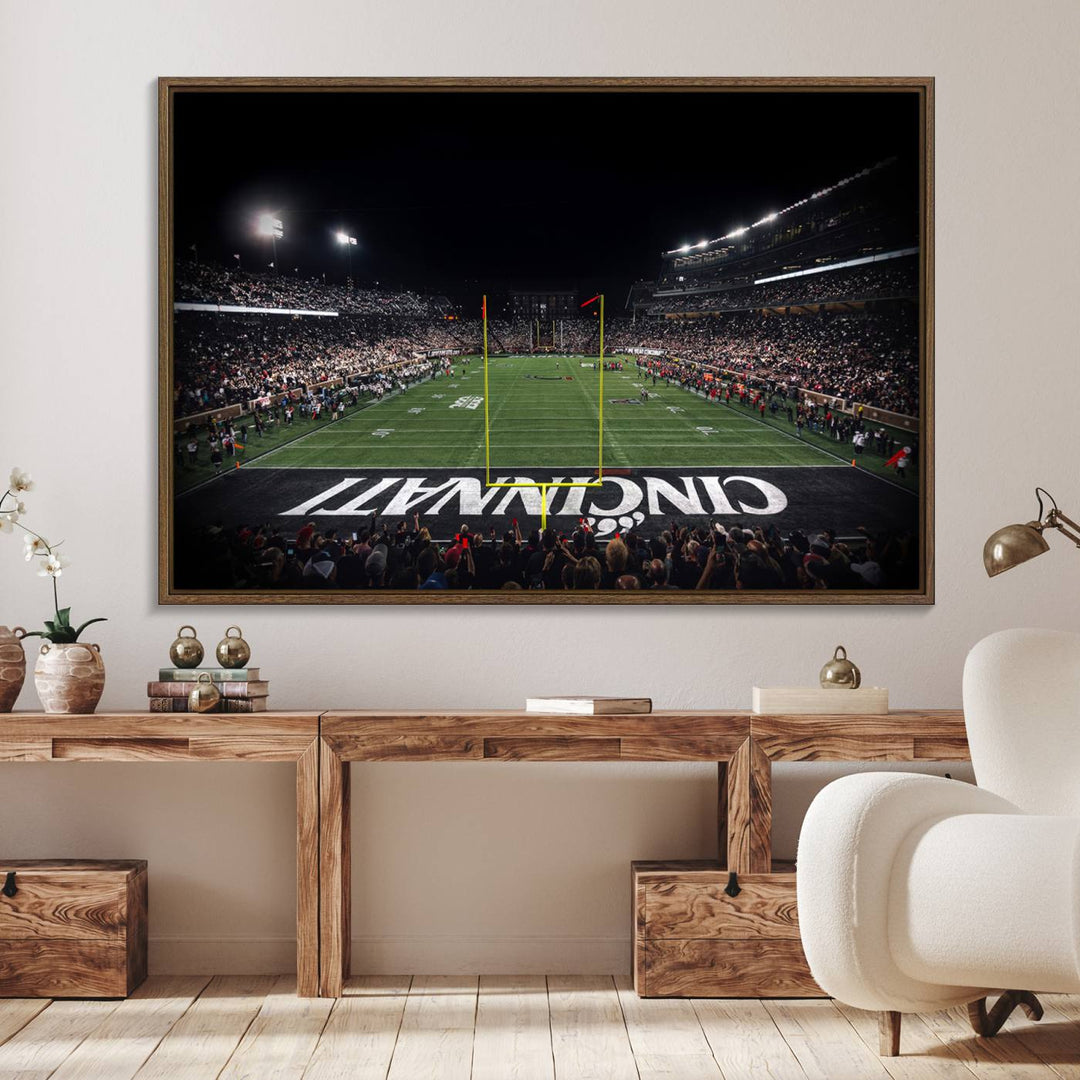 Interior view featuring a Cincinnati Bearcats football canvas of Nippert Stadium.