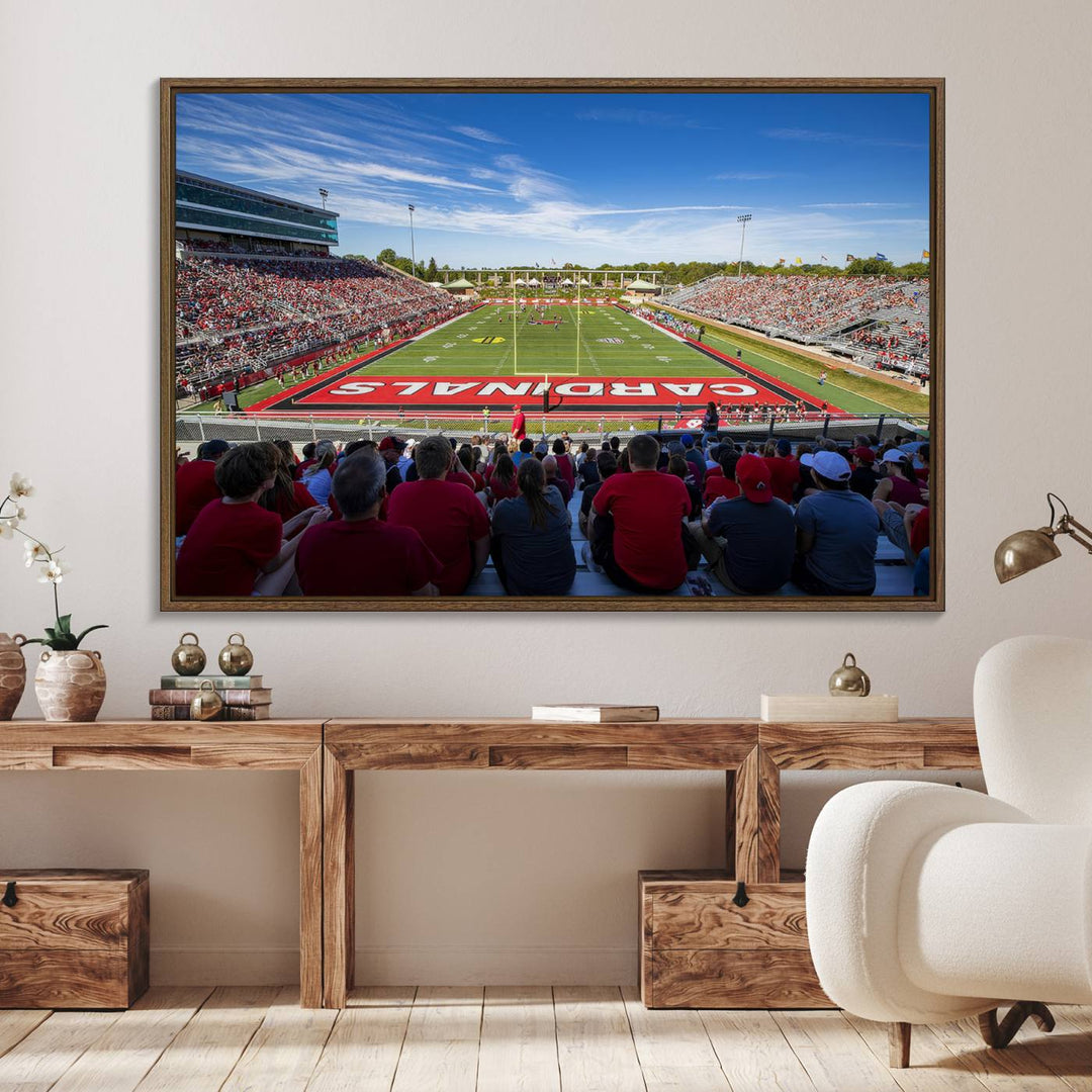 The Ball State Cardinals wall art on canvas depicts fans in red at Scheumann Stadium.