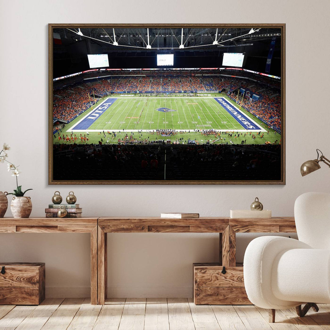 The UTSA Roadrunners game at Alamodome canvas print captures the scene from above, displaying fans and the UTSA lettering on the field.