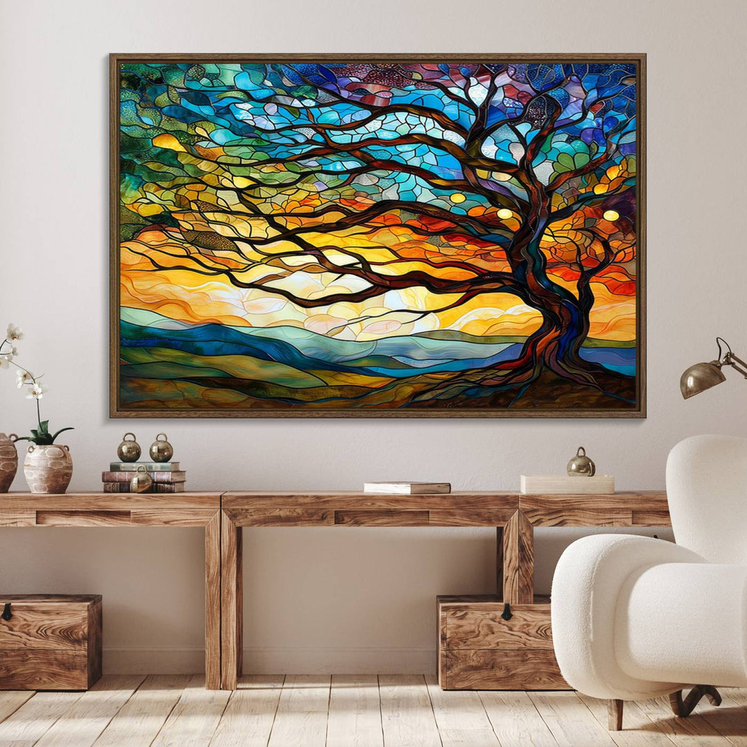 A vivid Tree of Life in stained glass style is depicted with twisted branches, a colorful sky, and hills on a ready-to-hang canvas.