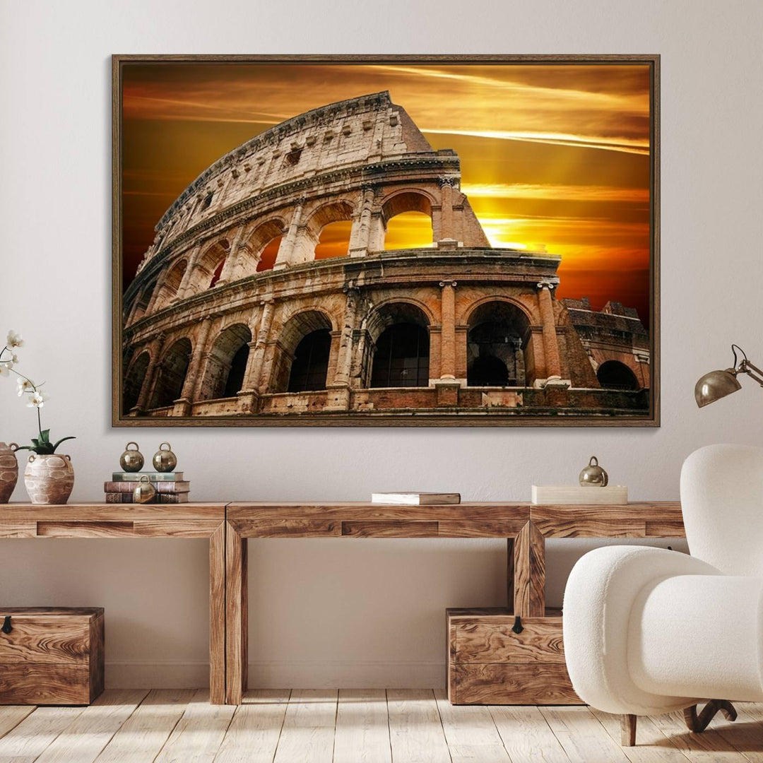 On the wall, theres a piece of art titled Colosseum with Yellow Sunset Behind, Italy.