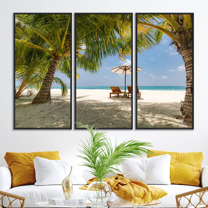 The canvas art print titled Lounge Chairs Palm Trees on Tropical Beach offers free shipping.