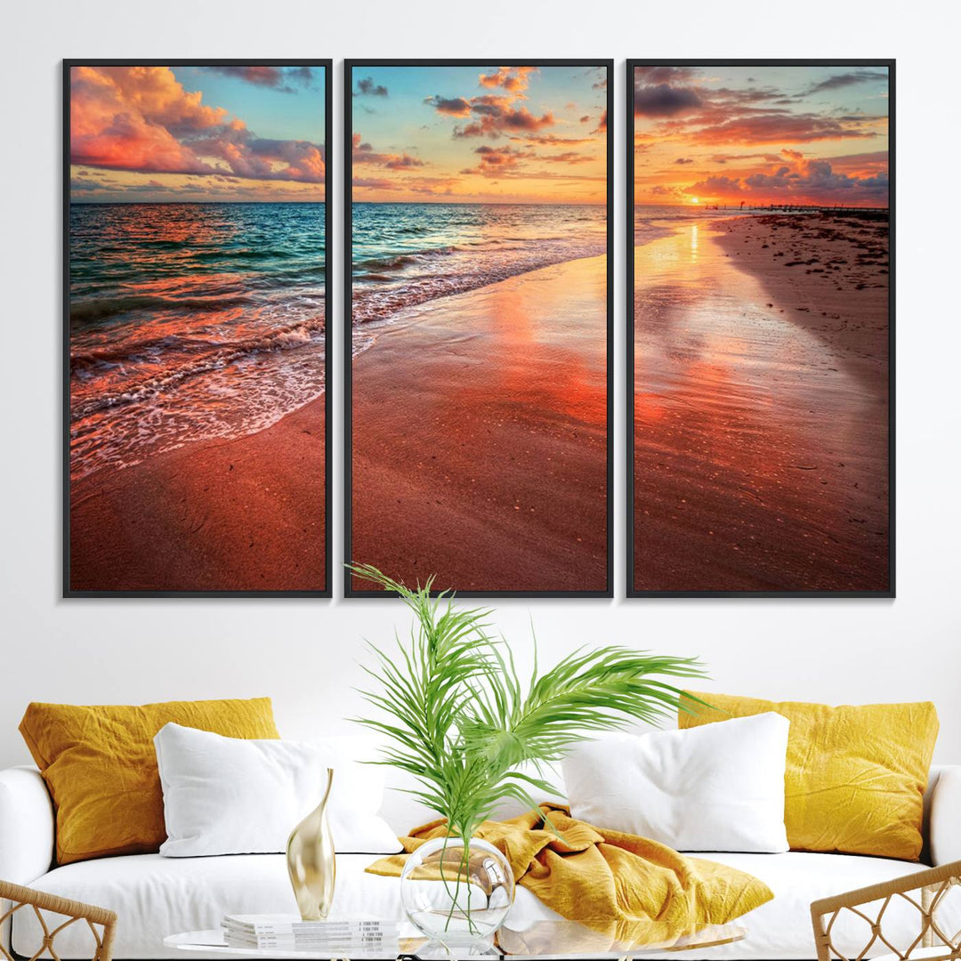 A Vibrant Sunset Beach Canvas Print with ocean waves and sandy shoreline enhances coastal-themed interiors.