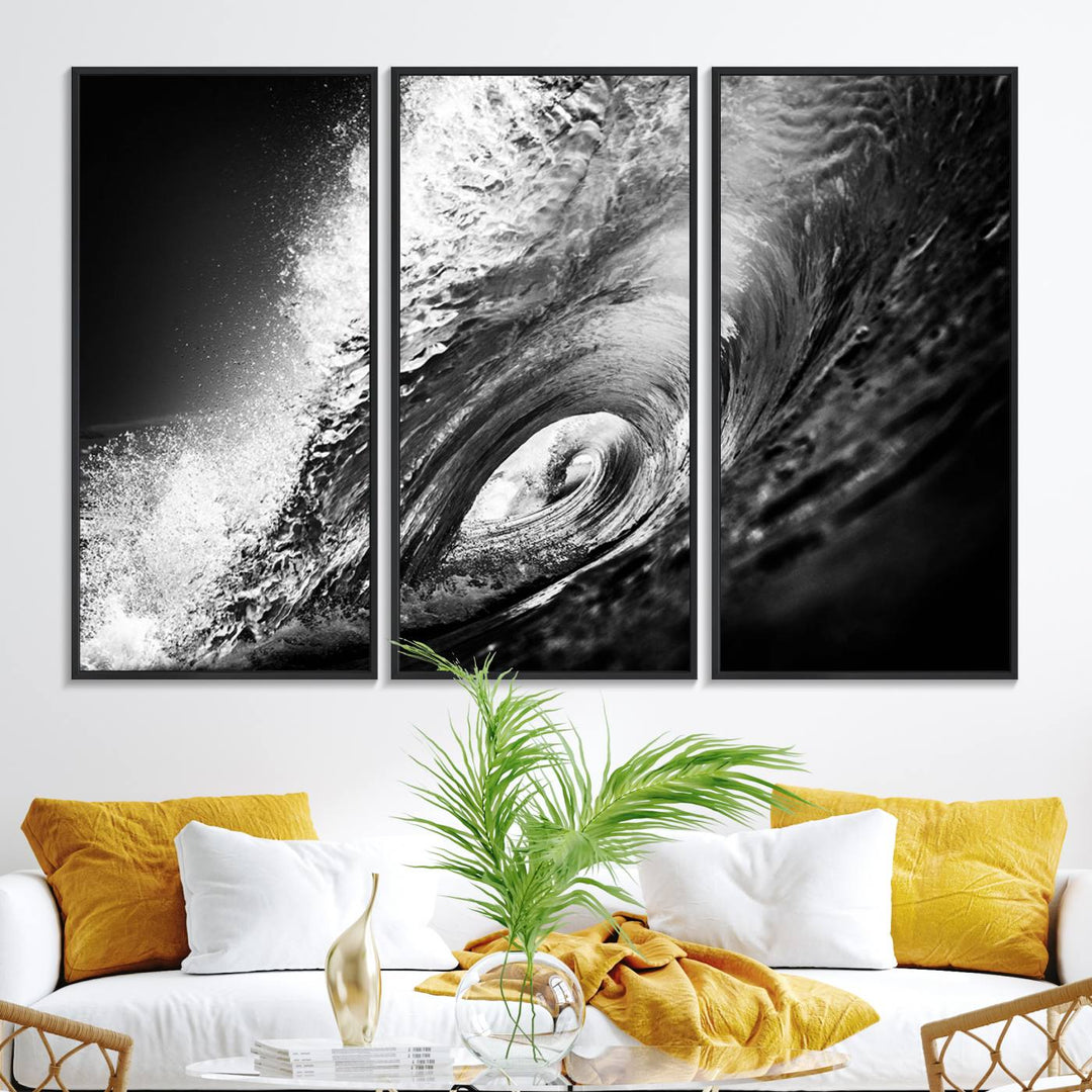 The Black Ocean Wave at Sunset Canvas Art hangs on a grey wooden wall.