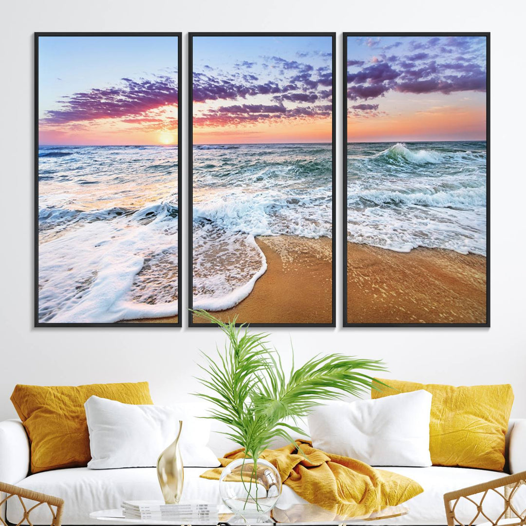 The Vivid Sunset Ocean Waves Triptych hangs on a wooden wall.