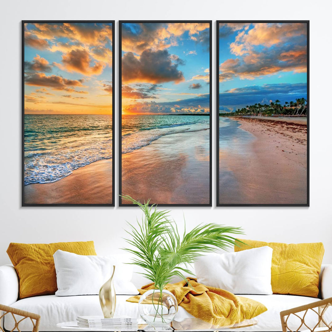 A wall displays Sunset Ocean Waves on Tropical Beach 3-panel canvas art.