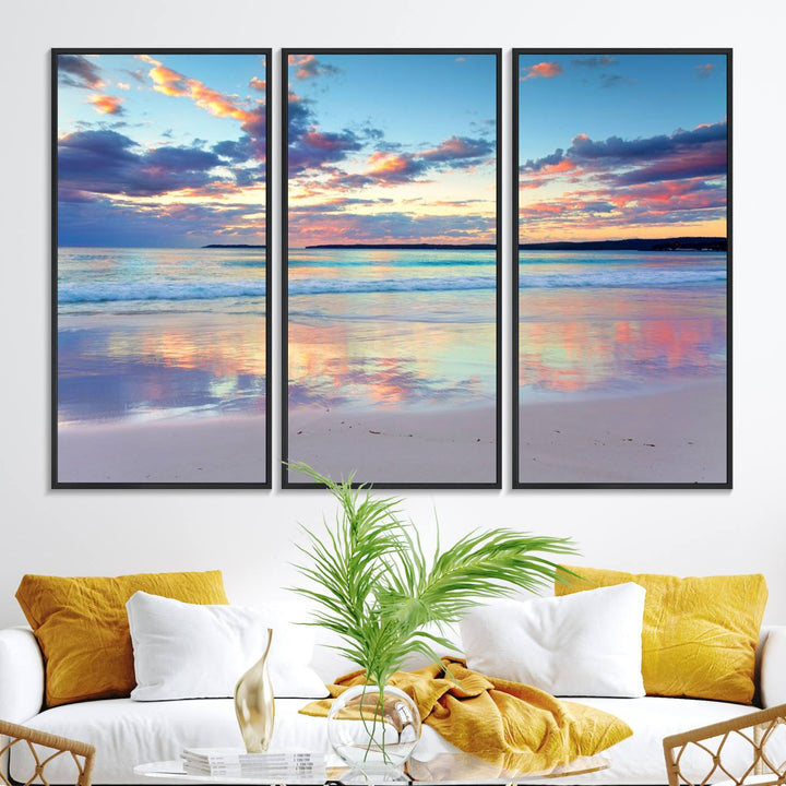 The Tranquil Pastel Sunset Beach Triptych Canvas Art hangs, showcasing its serene beauty.