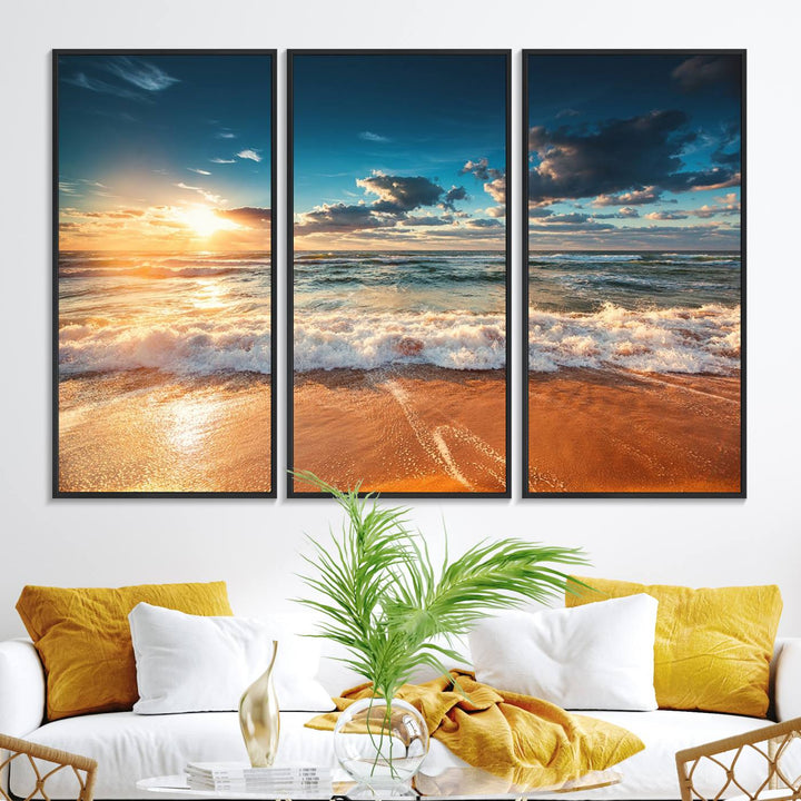 A Golden Sunset Beach Triptych Canvas Art hangs on a white wall.