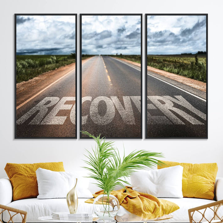 The Recovery Road Wall Art Canvas Print depicts a road under a cloudy horizon.