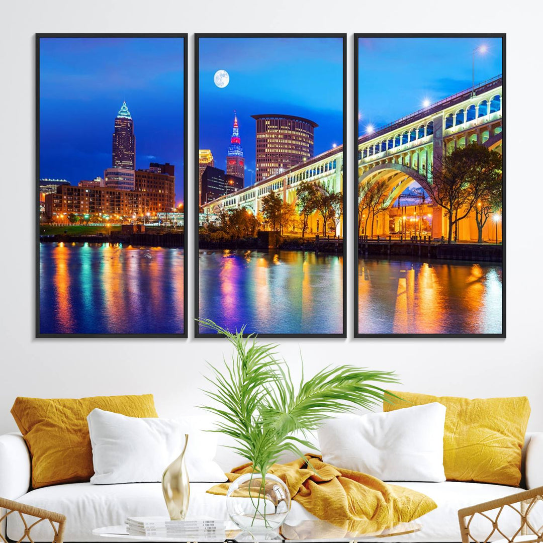 A Cleveland Night Skyline Wall Art on museum-quality canvas showcases a bridge and illuminated buildings.