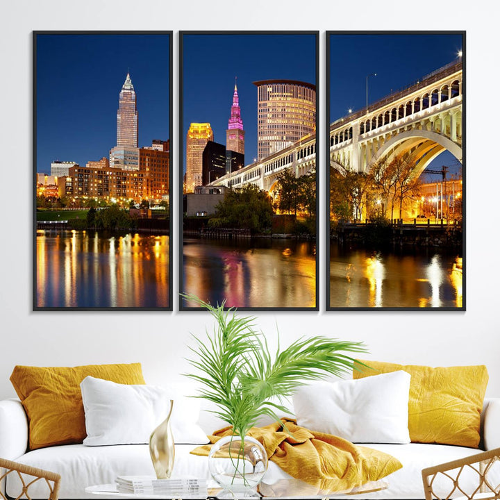 The Cleveland City Lights Canvas showcases a lit-up bridge and cityscape at night.