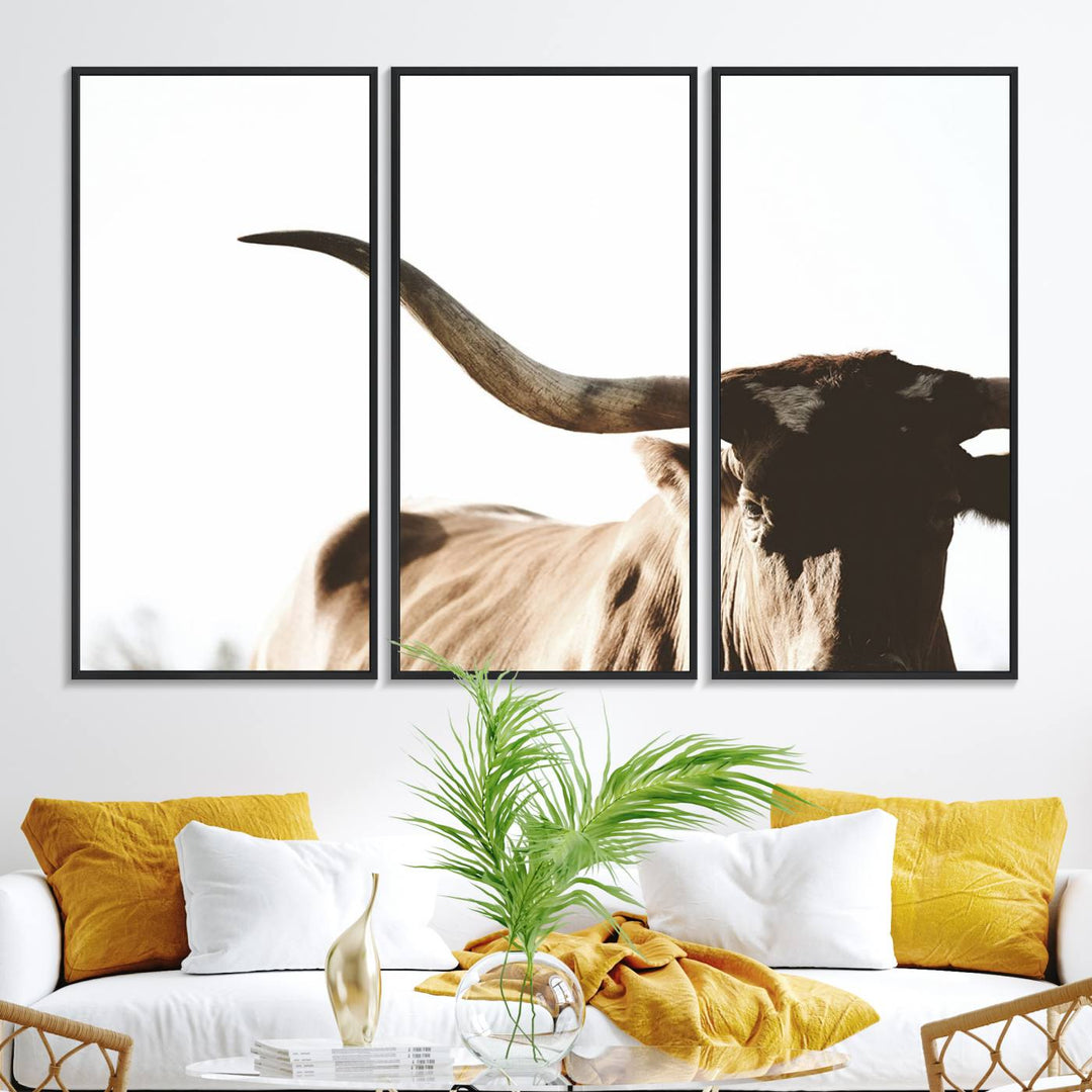 A 3-panel Texas Longhorn canvas adds a touch of rustic Western decor.